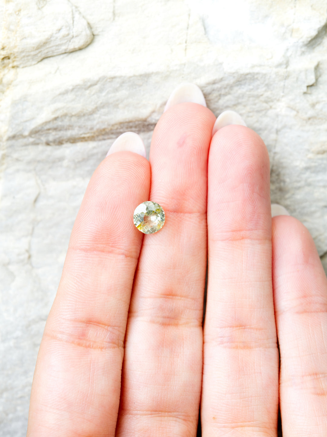 Lichen Glow — 1.550ct yellow round Montana sapphire, 7mm, unheated