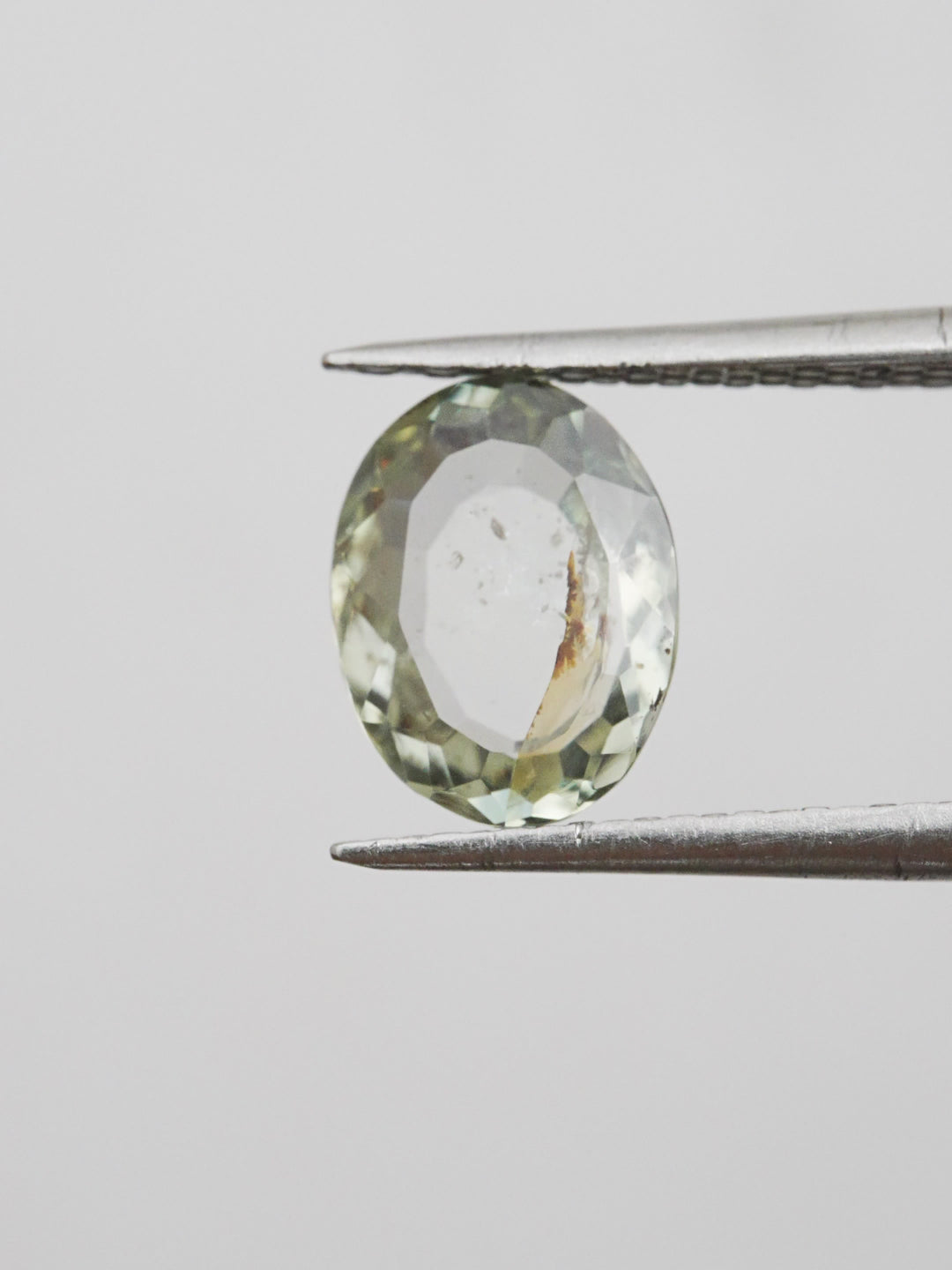 Amber Fault — 1.895ct green Montana sapphire, 9mm, unheated