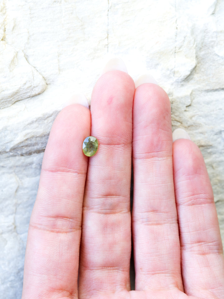 River Reed — 1.290ct green Montana sapphire, 7mm, heated