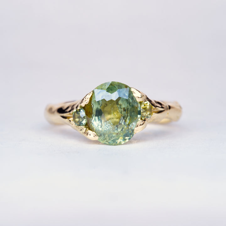 Oval Sunlit Green Montana Sapphire Ring - Three Stone