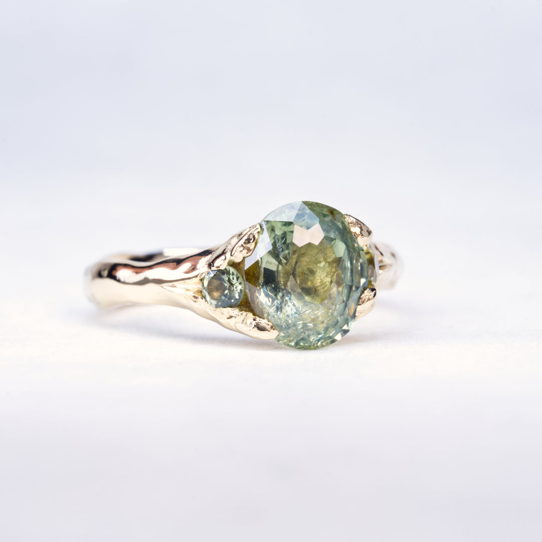 Oval Sunlit Green Montana Sapphire Ring - Three Stone