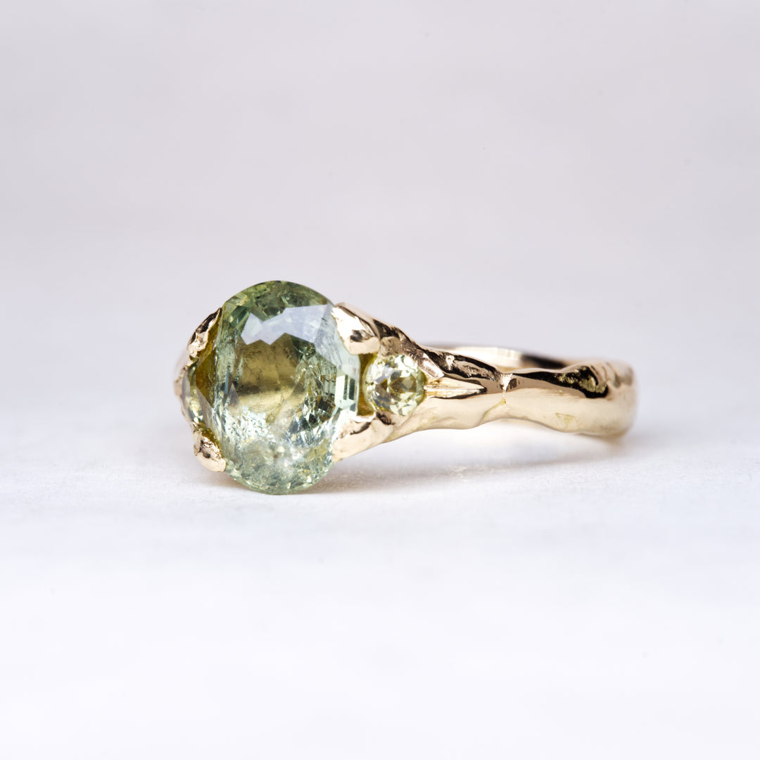 Oval Sunlit Green Montana Sapphire Ring - Three Stone