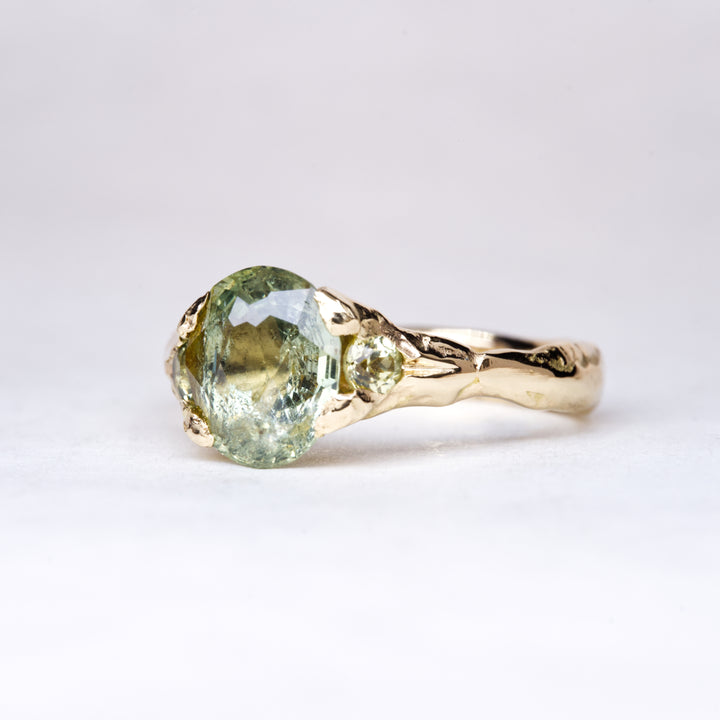 Oval Sunlit Green Montana Sapphire Ring - Three Stone