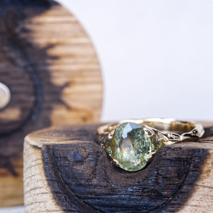 Oval Sunlit Green Montana Sapphire Ring - Three Stone