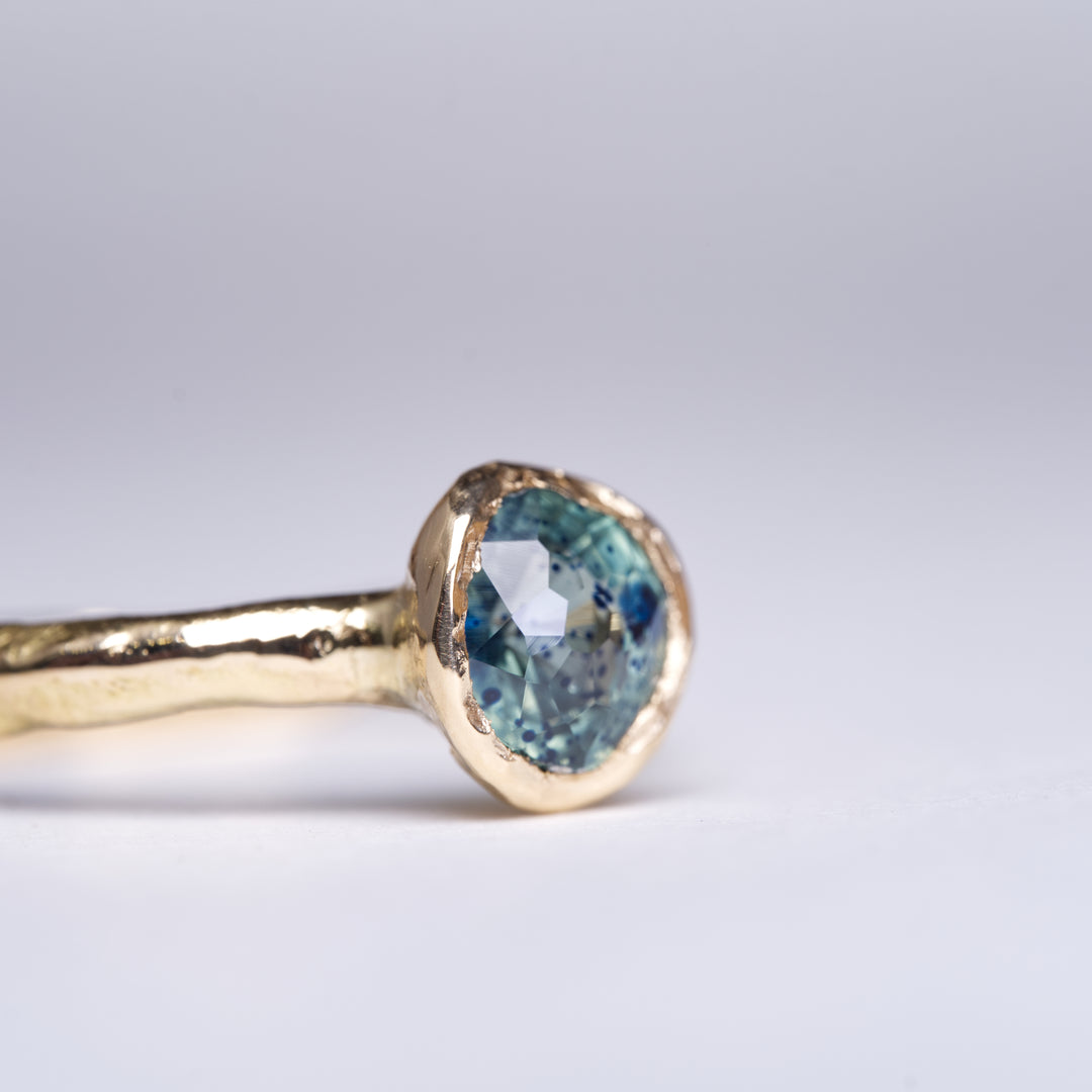 Speckled Teal Solitaire Montana Sapphire Ring