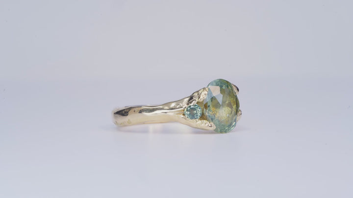Oval Sunlit Green Montana Sapphire Ring - Three Stone